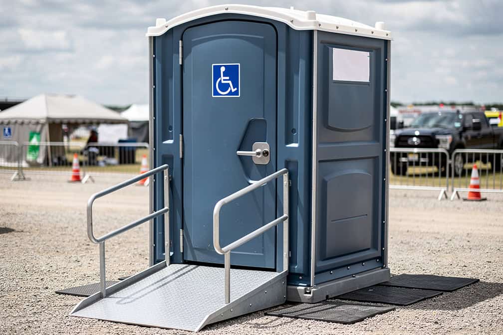 ADA compliant portable restroom placed on level ground